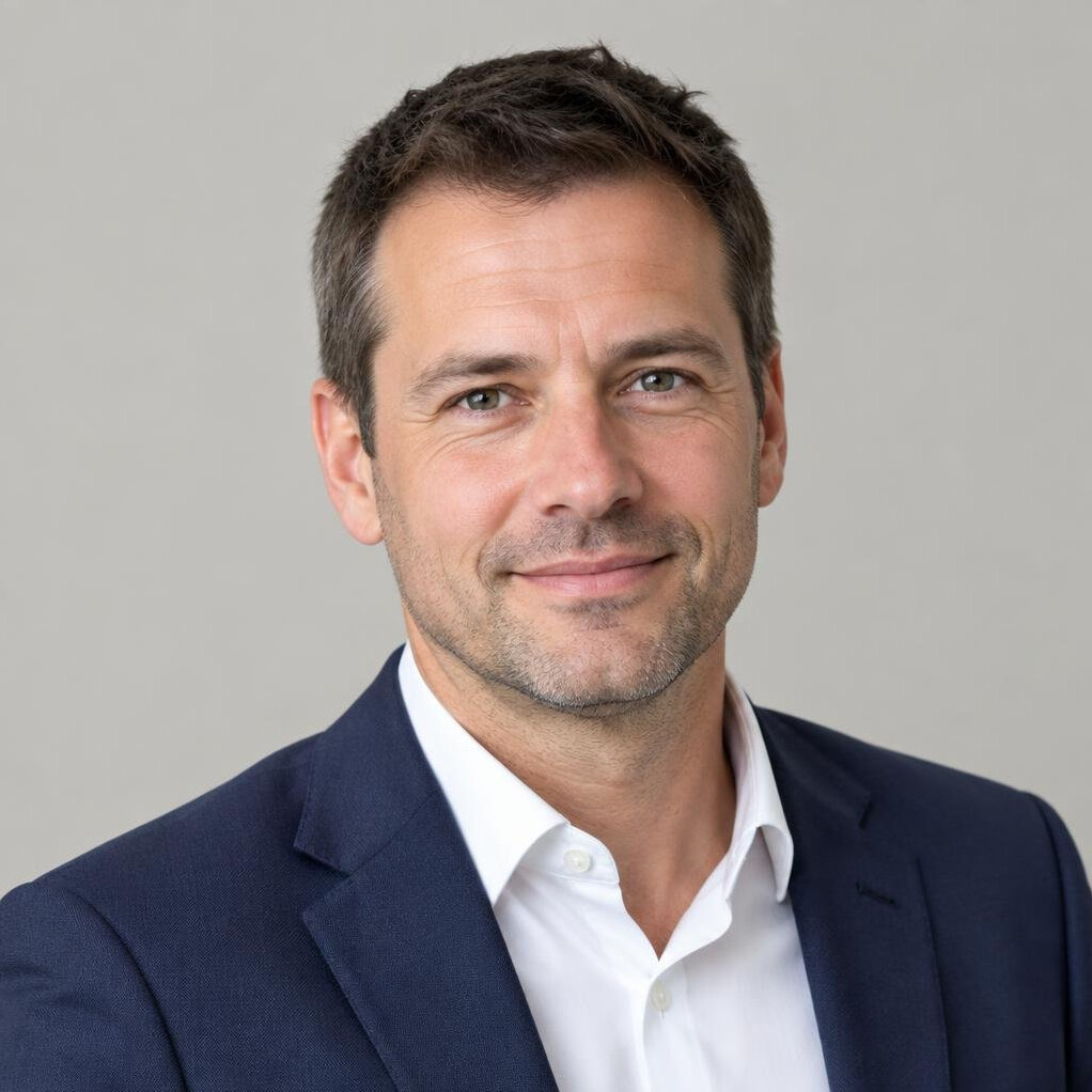 Portrait of a man in a suit smiling