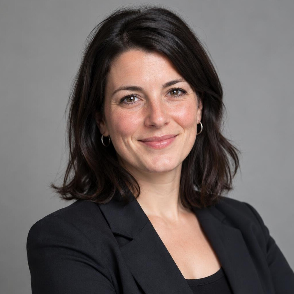 Portrait of a woman in a blazer smiling